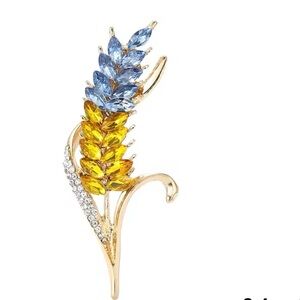 Elegant Gold and Blue Brooch